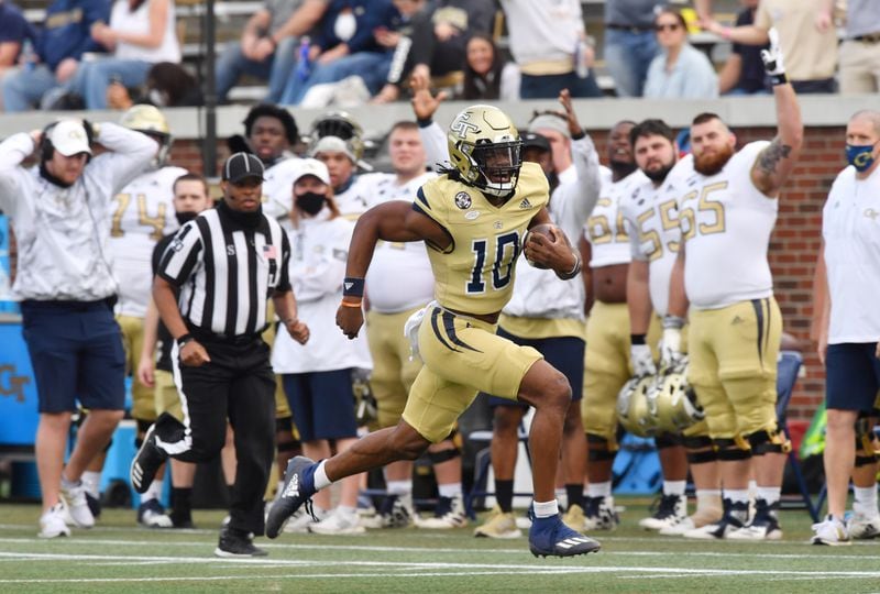 Georgia Tech quarterback Jeff Sims (10) runs for a touchdown during the 2021 Spring Game at Georgia Tech's Bobby Dodd Stadium in Atlanta on Friday, April 23, 2021. (Hyosub Shin / Hyosub.Shin@ajc.com)