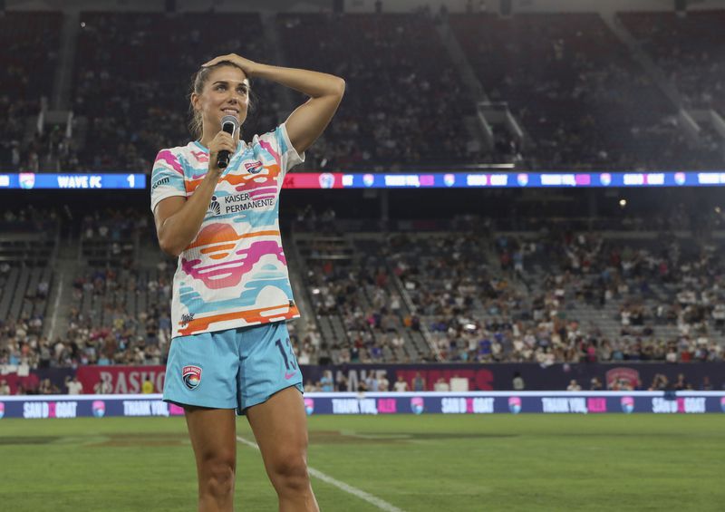 San Diego Wave's Alex Morgan speaks after an NWSL soccer game against the North Carolina Courage on Sunday, Sept. 8 2024, in San Diego. (Sandy Huffaker/The San Diego Union-Tribune via AP)