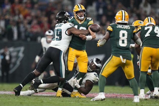 Green Bay Packers quarterback Jordan Love (10) gets hurt during the second half of an NFL football game against the Philadelphia Eagles, Saturday, Sept. 7, 2024, at the Neo Quimica Arena in Sao Paulo. (AP Photo/Andre Penner)