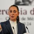 Mexican President Claudia Sheinbaum gives a media briefing from the National Palace in Mexico City, Wednesday, Oct. 2, 2024, the morning after her inauguration. (AP Photo/Fernando Llano)