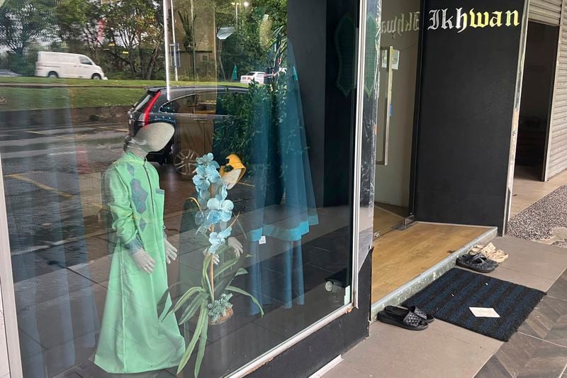 This photo shows a shop owned by Global Ikhwan, an Islamic business group linked to a banned religious cult, in suburb of central Selangor state, Malaysia Friday, Sept. 13, 2024. (AP Photo/Eileen Ng)