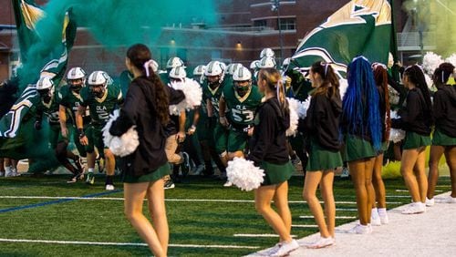 The Ola High School football team takes the field for its game against Jones County, Sept. 6, 2024.