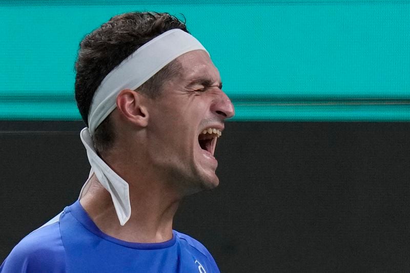 Terence Atmane of France reacts during the men's singles second round match against Taylor Fritz of the United States in the Shanghai Masters tennis tournament at Qizhong Forest Sports City Tennis Center in Shanghai, China, Monday, Oct. 7, 2024. (AP Photo/Andy Wong)