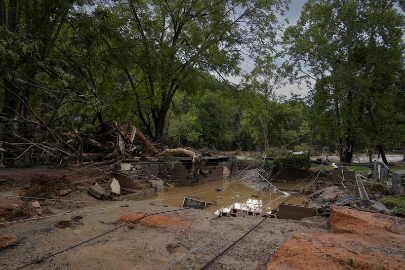 A home site destroyed by flood water is seen Saturday, Sept. 28, 2024, in Newport, Tenn. (AP Photo/George Walker IV)