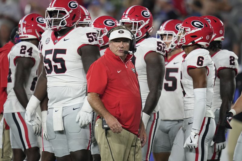 Georgia head coach Kirby Smart looks on during the first half of an NCAA college football game against Kentucky, Saturday, Sept. 14, 2024, in Lexington, Ky. (AP Photo/Darron Cummings)