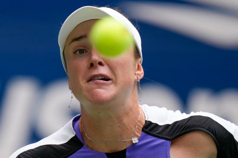 Elina Svitolina, of Ukraine, returns a shot to Coco Gauff, of the United States, during the third round of the U.S. Open tennis championships, Friday, Aug. 30, 2024, in New York. (AP Photo/Seth Wenig)