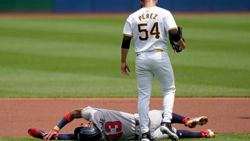 FILE - Pittsburgh Pirates starting pitcher Martín Pérez (54) checks on Atlanta Braves' Ronald Acuña Jr., who injured himself running the bases during the first inning of a baseball game against the Pittsburgh Pirates in Pittsburgh, Sunday, May 26, 2024. (AP Photo/Gene J. Puskar, File)