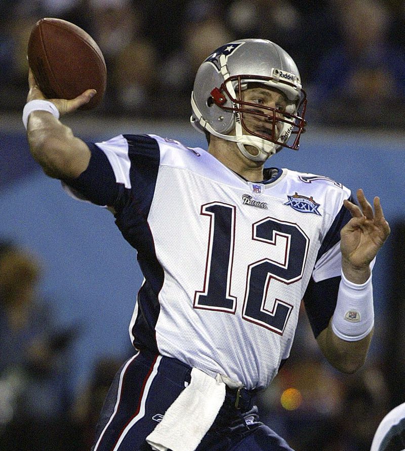 FILE - New England Patriots quarterback Tom Brady fires a pass in the first quarter against the Philadelphia Eagles during Super Bowl XXXIX at Alltel Stadium, Feb. 6, 2005, in Jacksonville, Fla. (AP Photo/Rusty Kennedy, File)