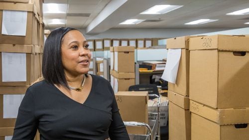 In addition to nearly 10,000 open cases, Fulton County's newly elected District Attorney Fani Willis has paralegals working full time to process cases left behind by the previous team in the office downtown Atlanta on Thursday, Feb 18, 2021.  (Jenni Girtman for The Atlanta Journal-Constitution)
