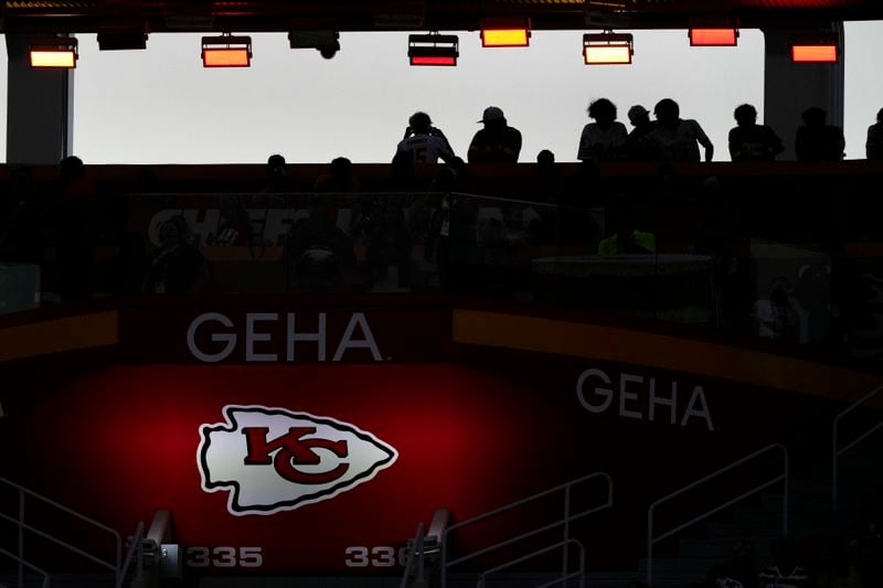 Fans watch in the stands during the first half of an NFL preseason football game between the Kansas City Chiefs and the Chicago Bears Thursday, Aug. 22, 2024, in Kansas City, Mo. (AP Photo/Charlie Riedel)