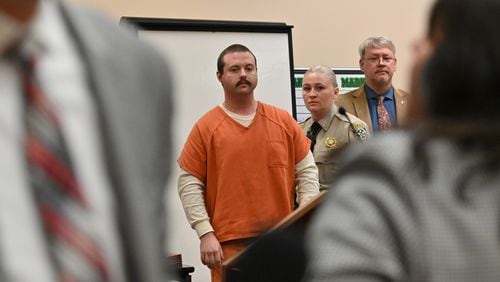 Michael Helterbrand is escorted out after Judge Jack Niedrach denied a bond at Floyd County Superior Court in Rome in February 2020. A judge denied bond to two men accused of belonging to a white supremacist group that allegedly plotted to kill a Bartow County couple, overthrow the government and start a race war. (Hyosub Shin / Hyosub.Shin@ajc.com)