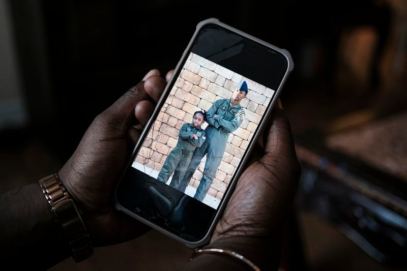 A photograph of SRA Roger Fortson and his sister Harmoni Fortson is seen on a cell phone  in Atlanta, GA on May 16, 2024. Fortson was killed by a Florida sheriff deputy on May 3 after answering his door while holding a gun. (Photo by Michael A. McCoy)