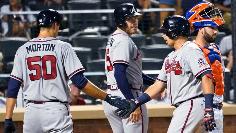 Braves defeat Nationals 10-3 behind Freeman's grand slam