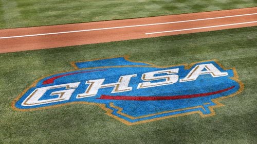 051722 Peachtree Corners: The Georgia High School Association or GHSA logo is painted on the baseball field before Wesleyan’s game against Mount Paran in the Private A semifinal playoff series at Wesleyan School Tuesday, May 17, 2022, in Peachtree Corners, Ga. (Jason Getz / Jason.Getz@ajc.com)