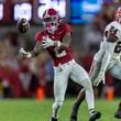 Alabama wide receiver Ryan Williams (2) makes a difficult bobbled catch with Georgia defensive back Malaki Starks (24) defending during the second half of an NCAA college football game, Saturday, Sept. 28, 2024, in Tuscaloosa, Ala. (AP Photo/Vasha Hunt)