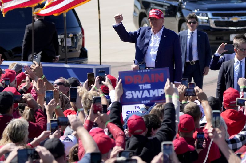 Republican presidential nominee former President Donald Trump arrives to speak during a campaign event at Central Wisconsin Airport, Saturday, Sept. 7, 2024, in Mosinee, Wis. (AP Photo/Morry Gash)