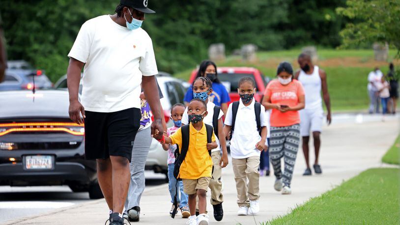 Opinion: Calendar says back to school but August heat says stay in