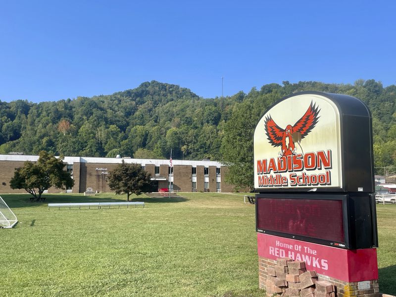 A sign is shown Thursday, Aug. 29, 2024 outside of Madison Middle School, where a student at the school died of a brain injury Saturday, one day he was hurt making a tackle in football practice in Madison, W.Va. (AP Photo/John Raby)