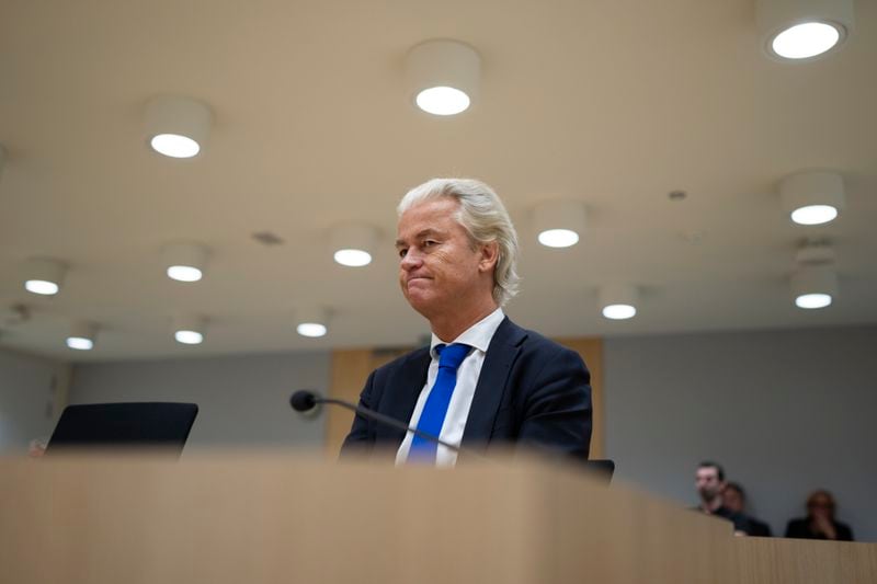 Anti-Islam lawmaker Geert Wilders, takes his seat at the high security court at Schiphol, near Amsterdam, Netherlands, Monday, Sept. 9, 2024, to hear the verdict against two Pakistani men on charges of threatening Wilders. (AP Photo/Peter Dejong)