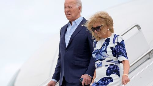 President Joe Biden, left, and first lady Jill Biden arrive at Francis S. Gabreski Airport, Saturday, June 29, 2024, in Westhampton Beach, N.Y. (AP Photo/Evan Vucci)