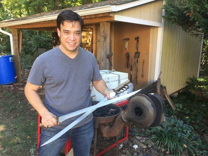Lilburn's Eric Anthony Leong creates props for movies and TV shows. These swords were used on the NBC TV show "Revolution." CREDIT: Rodney Ho/ rho@ajc.com