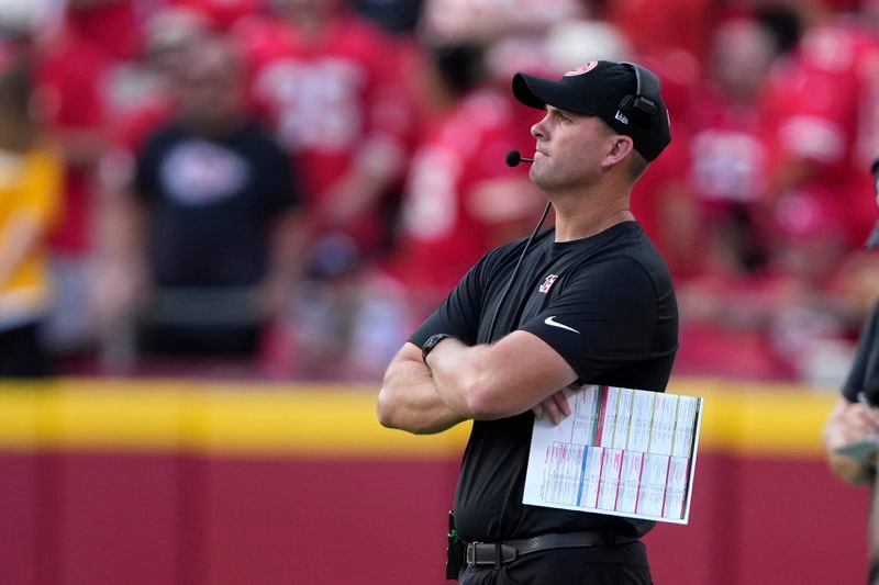 Cincinnati Bengals head coach Zac Taylor watches from the sidelines during the first half of an NFL football game against the Kansas City Chiefs Sunday, Sept. 15, 2024, in Kansas City, Mo. (AP Photo/Charlie Riedel)