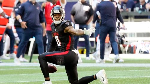 Atlanta Falcons tight end Kyle Pitts (8) reacts after a catch for a first down during the second half against the Houston Texans on Sunday, October 8, 2023, at Mercedes-Benz Stadium in Atlanta. 
Miguel Martinz/miguel.martinezjimenez@ajc.com