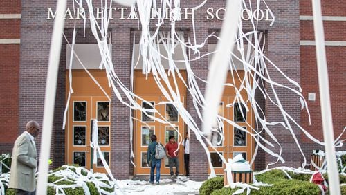 Following with tradition, the new seniors of Marietta High School hurled toilet paper across their school the night before the first day of school in Marietta, Wednesday, Aug. 2, 2023. (Katelyn Myrick/katelyn.myrick@ajc.com)