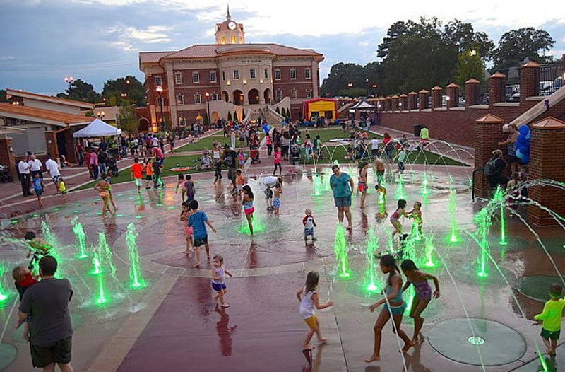 Enjoy the splash park as well as food and music at Sugar Hill's Splash Night.