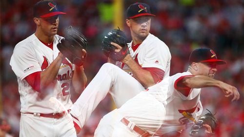 St. Louis Cardinals pitcher Jack Flaherty delivers a pitch against the Braves in the sixth inning May 26, 2019, at Busch Stadium in St Louis. (Editors Note: Image was created using multiple exposure in camera)