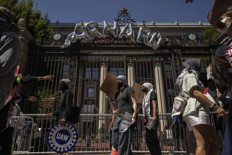 Pro-Palestinian supporters hold picket line outside Barnard College, Tuesday, Sept. 3, 2024, in New York. (AP Photo/Yuki Iwamura)