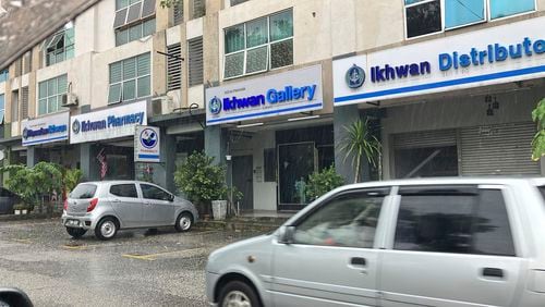 This photo shows buisiness shops owned by Global Ikhwan, an Islamic business group linked to a banned religious cult, in suburb of central Selangor state, Malaysia Friday, Sept. 13, 2024. (AP Photo/Eileen Ng)