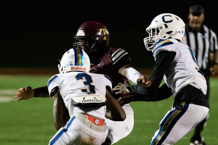 Chamblee's Larry Harris gets tackled during their game against Tucker, October 6, 2023. (Jamie Spaar for the Atlanta Journal Constitution)