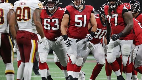 Atlanta Falcons offensive lineman Chris Lindstrom (from left), Alex Mack, and James Carpenter get in some quality bonding time against the Washington Redskins this preseason. (Curtis Compton/ccompton@ajc.com)