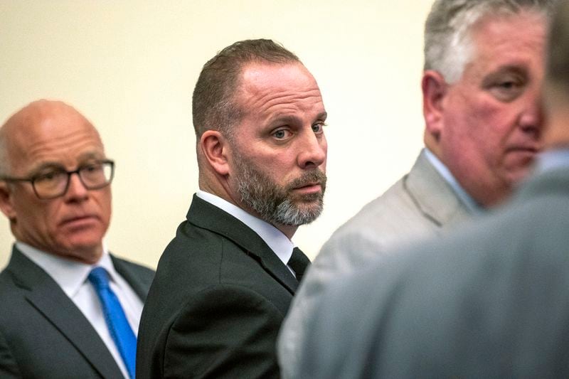 FILE - Former Franklin County Sheriff's office deputy Jason Meade, center, stands with defense attorneys Steve Nolder, left, and Mark Collins, right, on Jan. 31, 2024, in Columbus, Ohio. (Brooke LaValley/The Columbus Dispatch via AP, File)