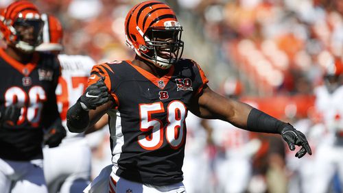 Carl Lawson #58 of the Cincinnati Bengals celebrates a play in the first half against the Cleveland Browns at FirstEnergy Stadium on October 1, 2017 in Cleveland, Ohio