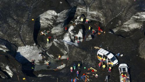 Rescue teams at the scene after an ice cave partially collapsed, at the Breidamerkurjokull glacier, in southeastern Iceland, Monday, Aug, 26, 2024. (STOD2/ Vilhelm Gunnarsson via AP)