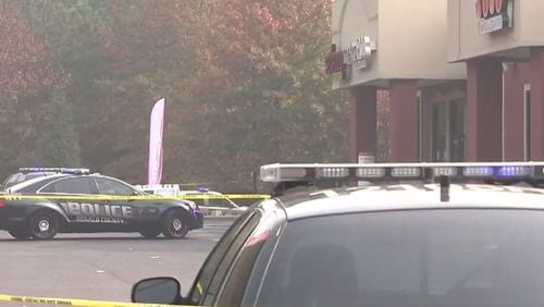 Police say two innocent bystanders were shot during a shootout near a gas station on DeKalb County's Snapfinger Woods Drive. (Credit: Channel 2 Action News)