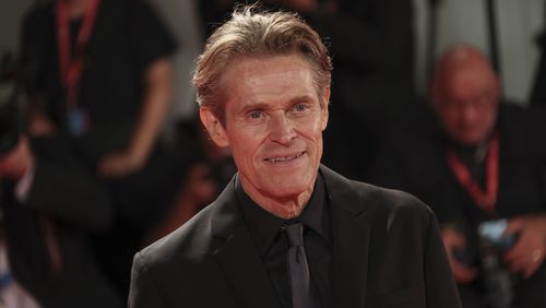 FILE - Willem Dafoe poses for photographers upon arrival at the 79th edition of the Venice Film Festival in Venice, Italy, Sept. 6, 2022. Dafoe, a frequent red-carpet star at the Venice Film Festival, was named artistic director Monday, July 8, 2024 of the Venice Biennale’s theatre department. Dafoe, who lives near Rome with his Italian wife, said the appointment came as a surprise but that he was “borne in the theatre” and trained initially as a stage actor. (Photo by Joel C Ryan/Invision/AP)