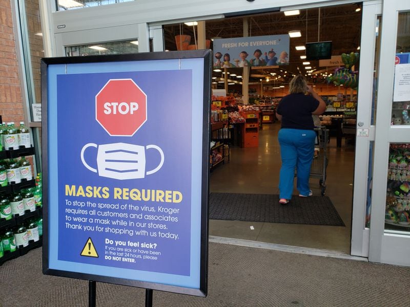 Kroger grocery stores are among major metro Atlanta retailers that recently began requiring customers to wear masks inside stores during the coronavirus pandemic. MATT KEMPNER / AJC