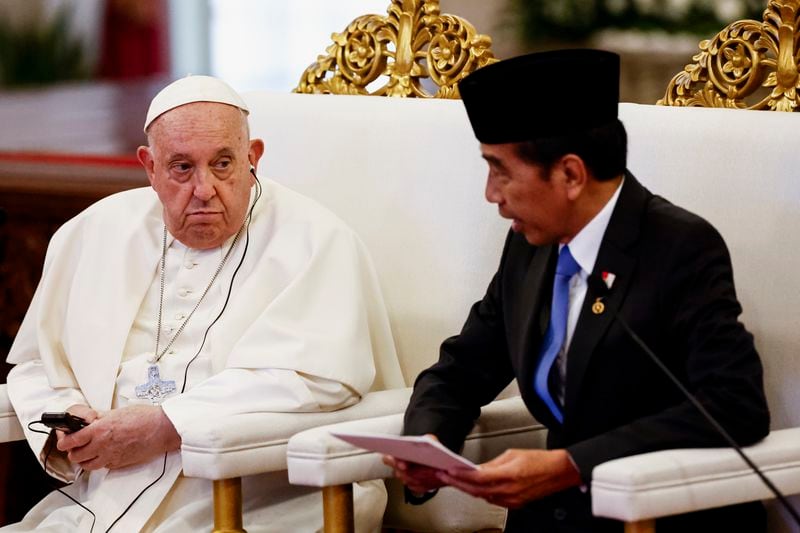 Pope Francis, left, and Indonesian President Joko Widodo attend a meeting with Indonesian authorities, civil society and the diplomatic corps, during his apostolic visit to Asia, at the Presidential Palace in Jakarta Wednesday, Sept. 4, 2024. (Willy Kurniawan/Pool Photo via AP)