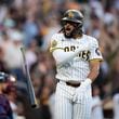 San Diego Padres' Fernando Tatis Jr. tosses his bat after hitting a two-run home run during the first inning in Game 1 of an NL Wild Card Series baseball game against the Atlanta Braves, Tuesday, Oct. 1, 2024, in San Diego. (AP Photo/Gregory Bull)