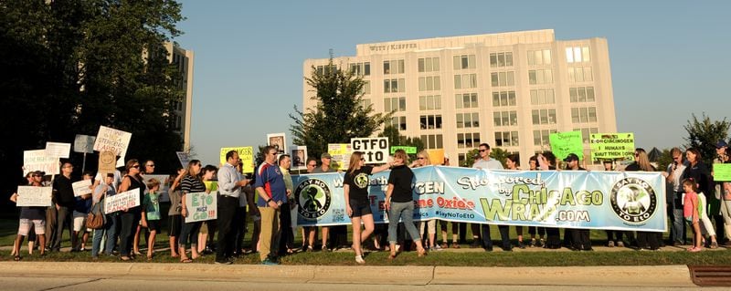 Incensed about ethylene oxide emissions in Willowbrook, Ill., more than 100 protesters rallied in front of Sterigenics’ headquarters in September 2018. In Georgia, state regulators swapped emails about the brewing controversy. MARK BLACK / FOR THE AJC