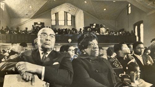 Alberta Williams King, right, attends a service at Ebenezer Baptist Church with husband Martin Luther King Sr. in January 1970. Alberta King was murdered in the same church in 1974 as she played the organ. (Chuck Vollertsen/AJC Archive at GSU Library AJCP443-116c)