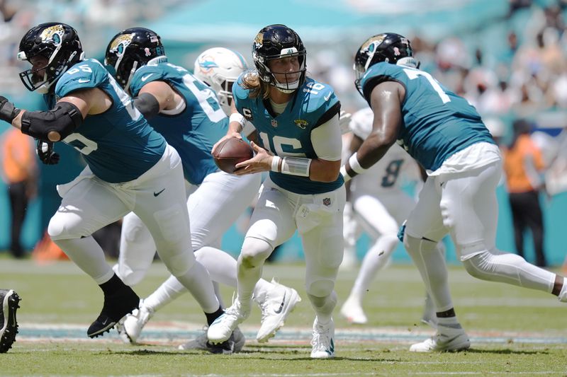 Jacksonville Jaguars quarterback Trevor Lawrence (16) looks to pass the ball during the first half of an NFL football game against the Miami Dolphins, Sunday, Sept. 8, 2024, in Miami Gardens, Fla. (AP Photo/Rebecca Blackwell)