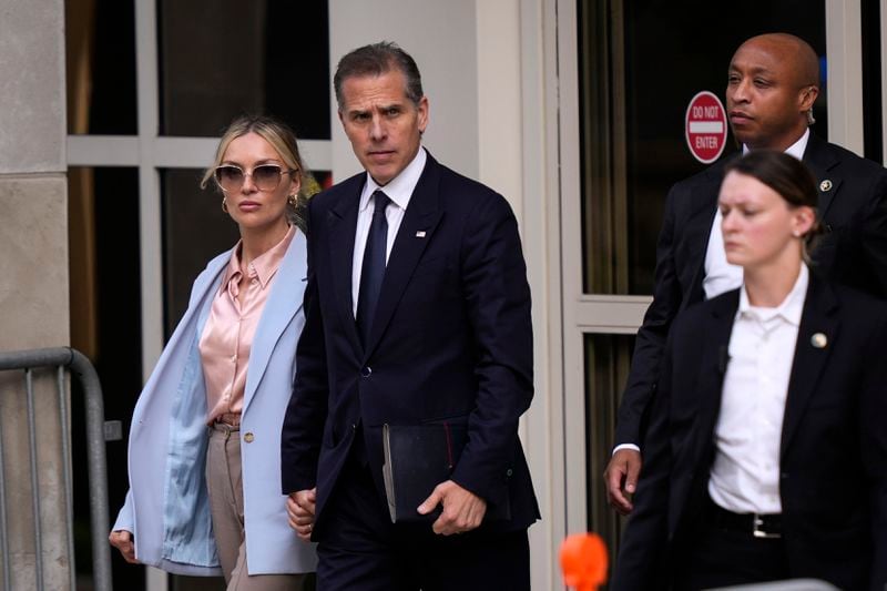 Hunter Biden, accompanied by his wife, Melissa Cohen Biden, departs from federal court, Tuesday, June 4, 2024, in Wilmington, Del. (AP Photo/Matt Rourke)