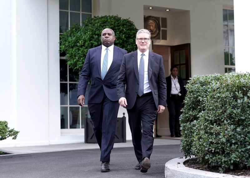 British Prime Minister Keir Starmer, right, and Foreign Secretary David Lammy leave the White House following a meeting with President Joe Biden, Friday, Sept. 13, 2024, in Washington. (Stefan Rousseau/PA via AP, Pool)