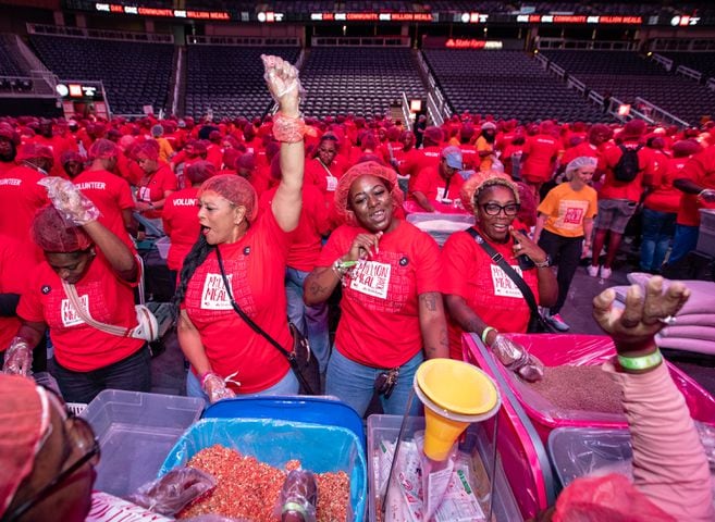 Monica Stokes, Bonica Franklin, Carri Washington and
Lashaunda Easley take a dance break.  (Jenni Girtman for The Atlanta Journal-Constitution)