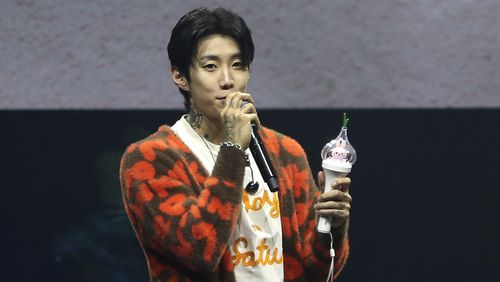 Korean American star Jay Park shows the garlic light stick of his fandom on stage during a fan meeting at Myunghwa Live Hall on Sunday, Aug 11, 2024, in Seoul. (AP Photo/Juwon Park)