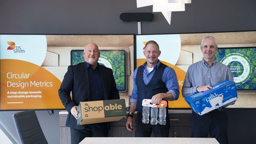 David McCracken, Business Unit Director at DS Smith (left), Jeff Jones, Business Services and Corporate Services Director (center), and Steven Rose, Managing Director of Packaging (right), display the company’s sustainable packaging innovations at their U.S. headquarters in Atlanta, Thursday, Oct. 3, 2024. DS Smith, a British-based packaging company with a focus on environmentally friendly solutions, is in talks to be acquired by International Paper for $7 billion. The acquisition aims to enhance sustainability efforts in the packaging industry. (Olivia Bowdoin for the AJC)